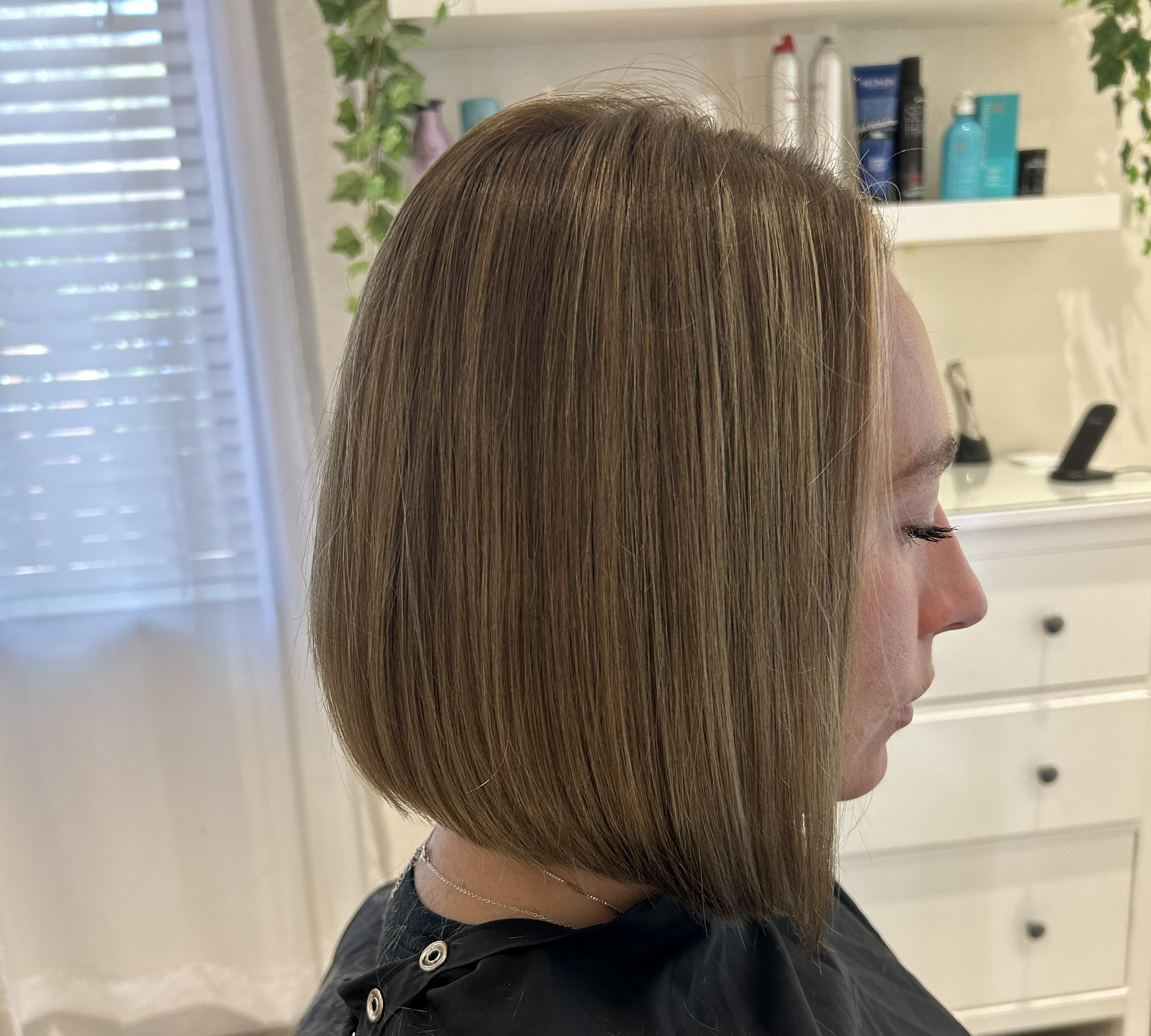 Short sleek a-line bob with baby highlights