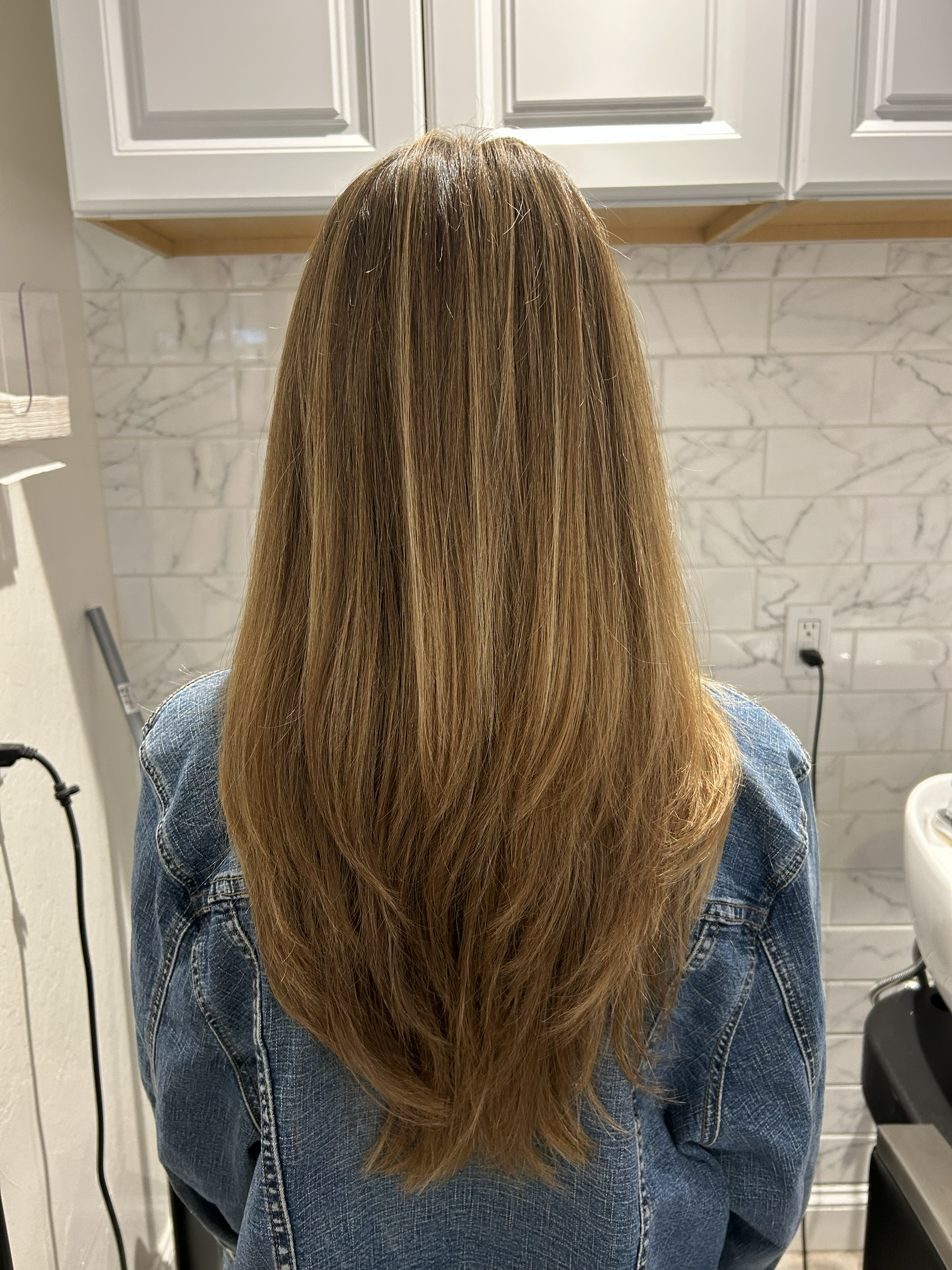 Long blonde hair with soft layers